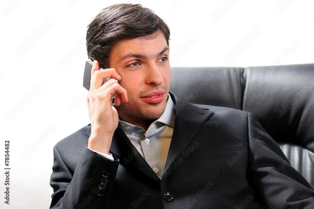 Close-up portrait of a successful handsome business man talking Close-up portrait of a successful handsome business man talking