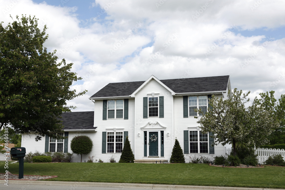 White two-story home