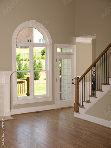 Luxury Model Home Living Room with Staircase