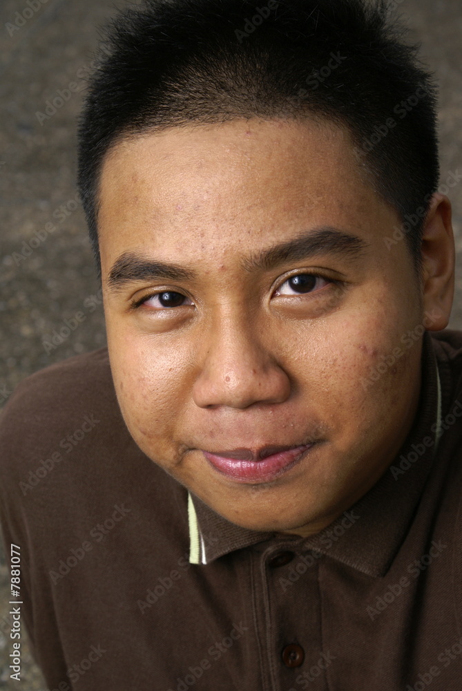 Obraz premium Smiling asian youth