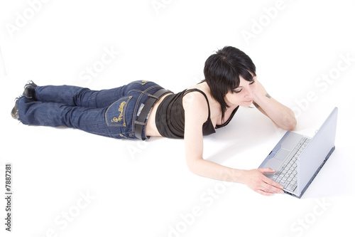 A young lady with a computer on white background.