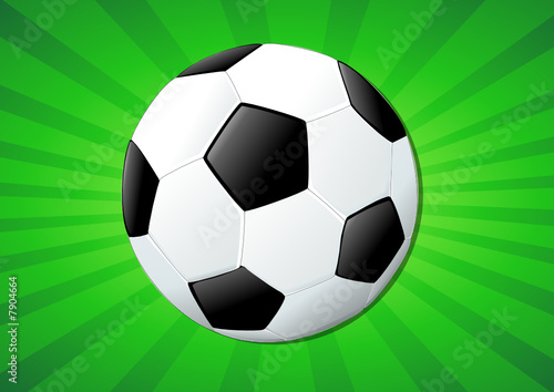 Ballon de football sur fond vert