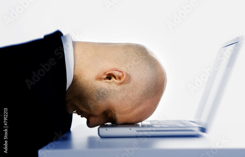 Stressed man and laptop