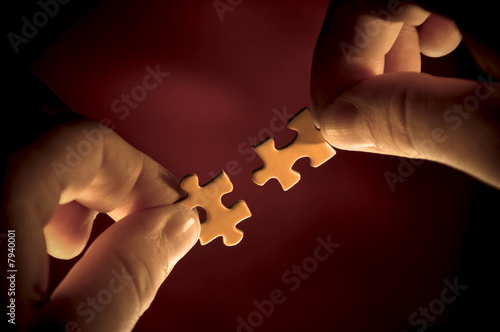 two puzzle pieces put together