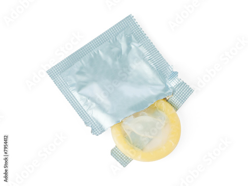 Unwrapped condom isolated on a white background.