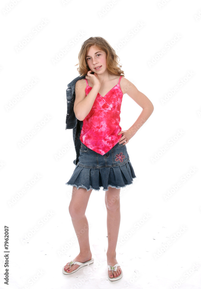 Full length picture of cute tween girl in stylish outfit Stock-foto | Adobe  Stock