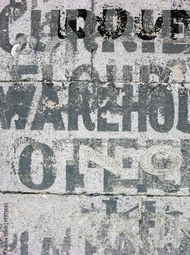 old warehouse stencils on concrete