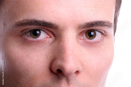 Extreme closeup portrait of young businessman