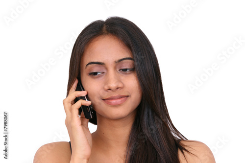 Teenage girl talking on phone
