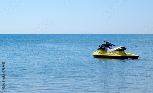 Fototapeta Naklejka Na Ścianę i Meble -  jet ski adrift in an open sea