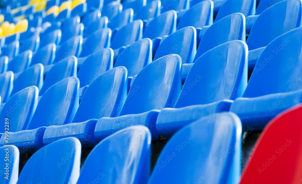 Fototapeta premium empty stadium chairs background