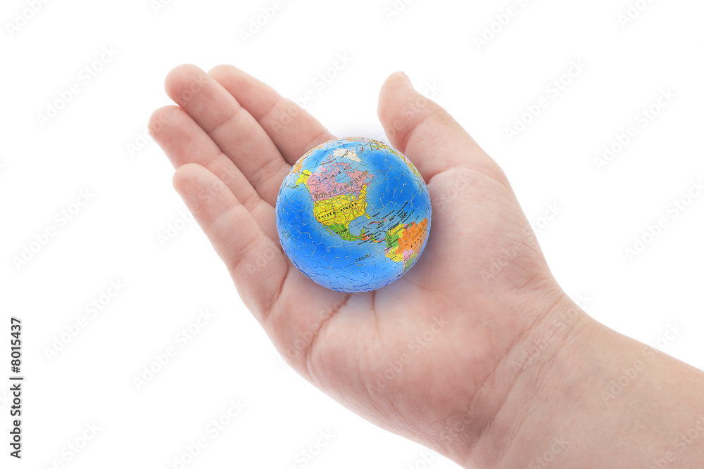 Globe in boy's hand Globe in boy's hand