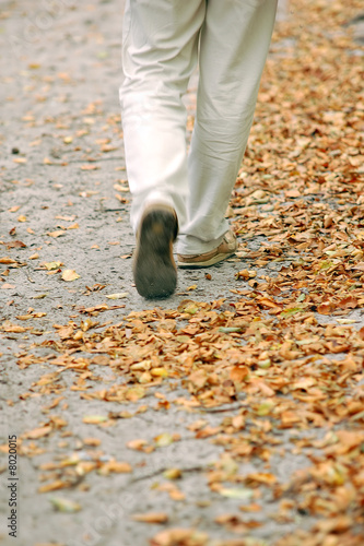 Walking through park photo