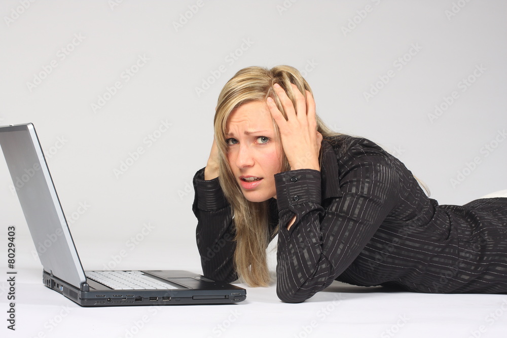 Businesswoaman having problem with laptop Businesswoaman having problem with laptop