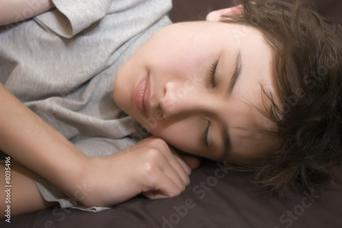 young teen boy sleeping