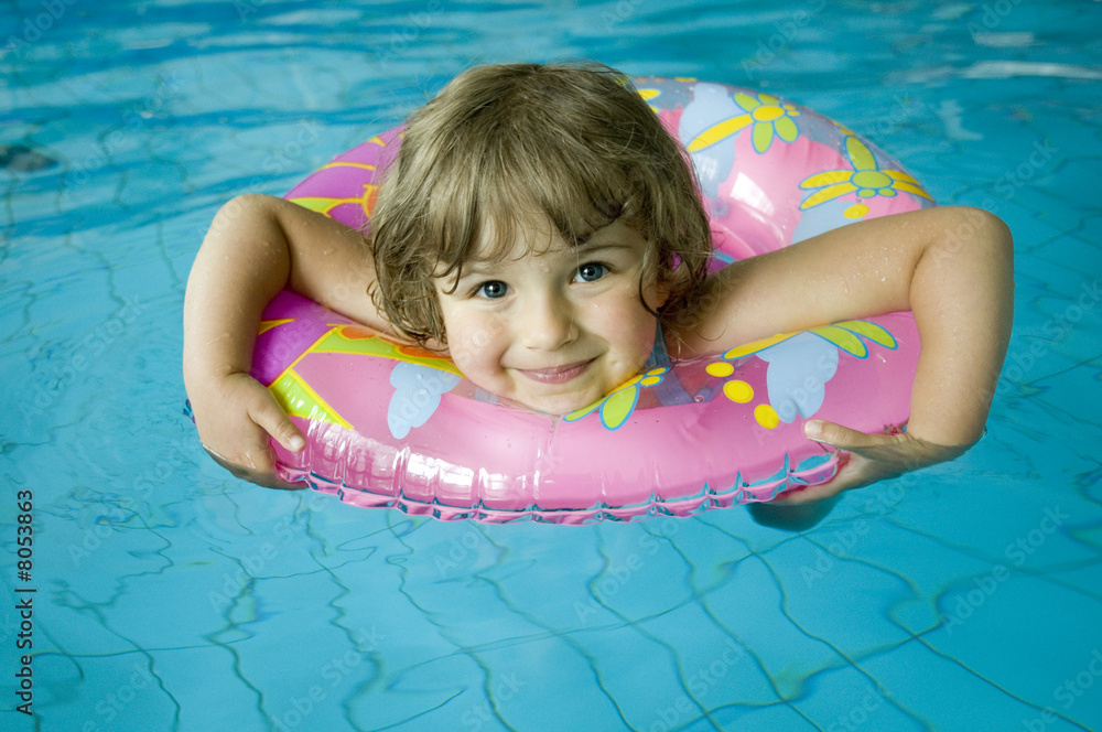 Little girl with inner tube Stock Photo Adobe Stock