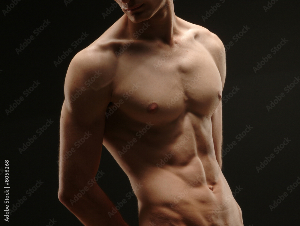 Young athlete - part of body over black Young athlete - part of body over black