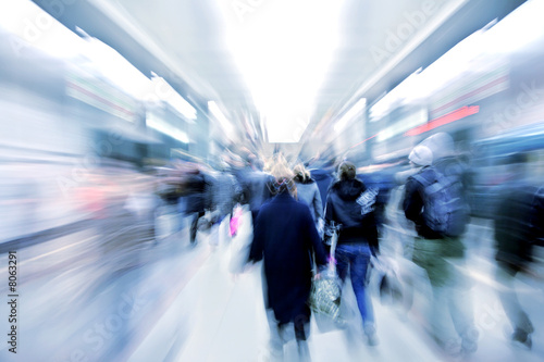 abstract zooming passengers in subway photo