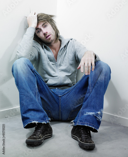 Man sitting in corner
