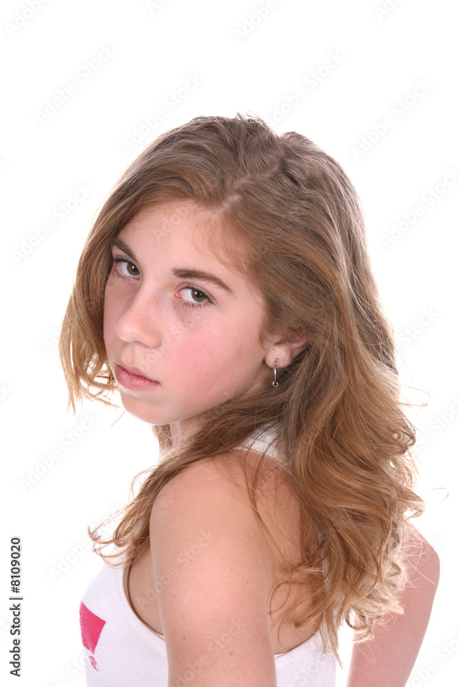 Pretty young girl with a rebellious look on her face. Pretty young girl with a rebellious look on her face.