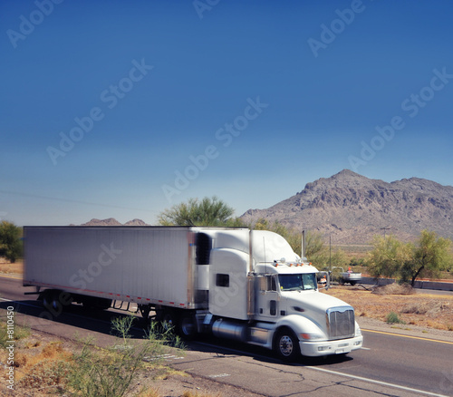 Truck driving through south west desert of Arizona