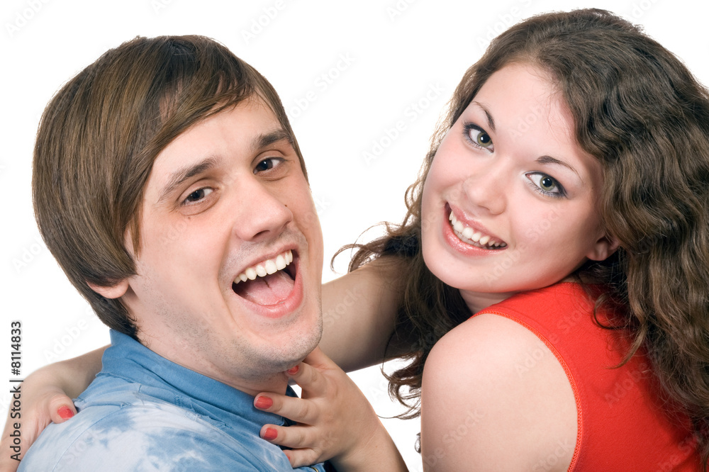 Portrait of the smiling young couple. Isolated. Portrait of the smiling young couple. Isolated.