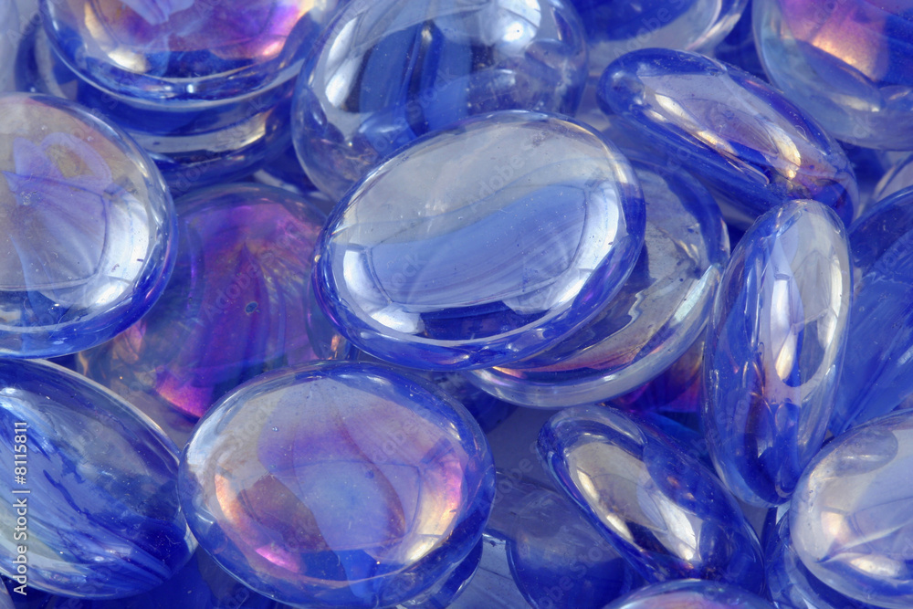 Some Blue glass beads macro texture background