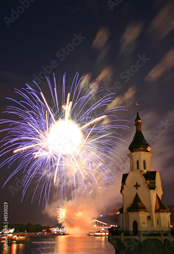 firework and church on river photo