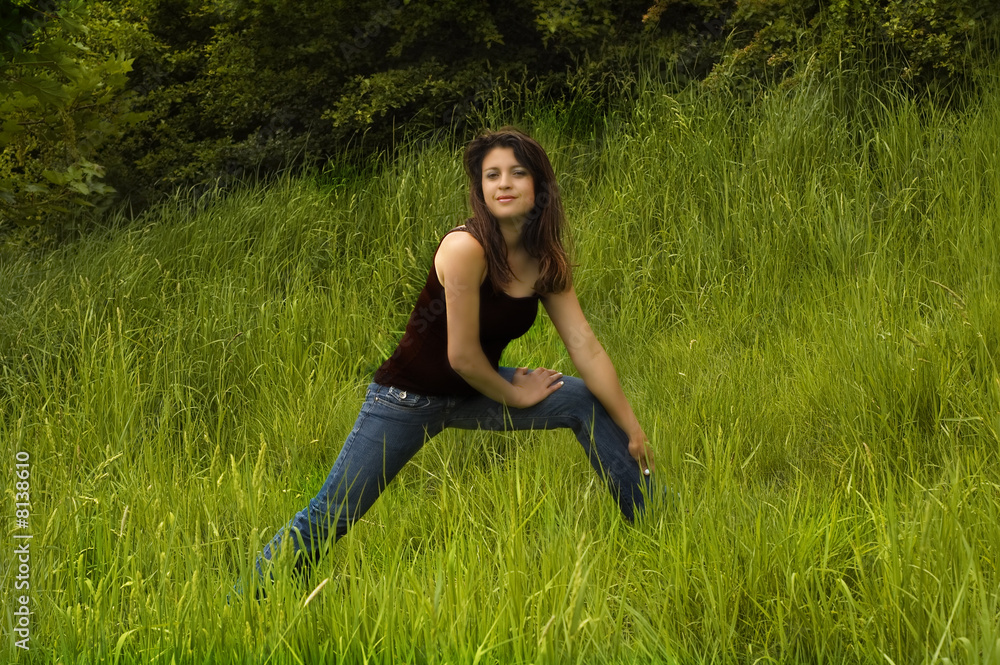 woman posing in a field woman posing in a field