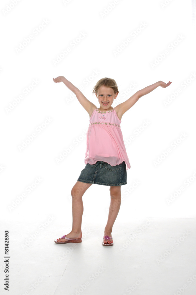 cute girl with arms raised as if in victory