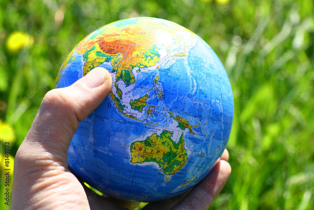 globe in hand globe in hand