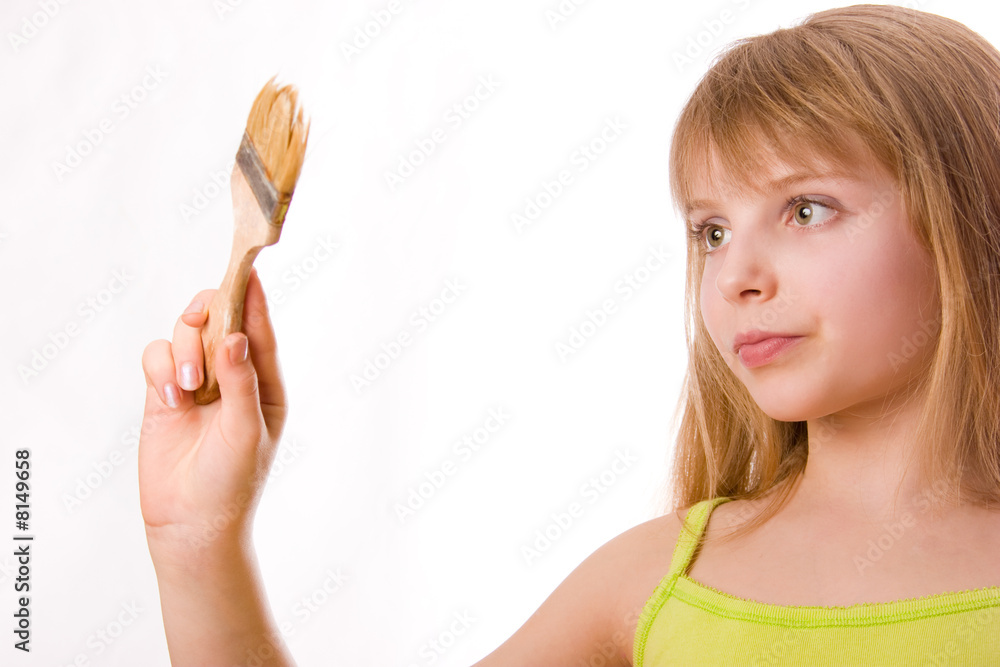 Nice teenager girl with painting brush Nice teenager girl with painting brush