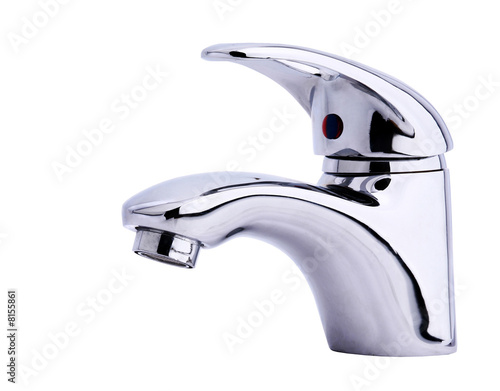 Modern stainless steel tap. Isolated on white background. photo