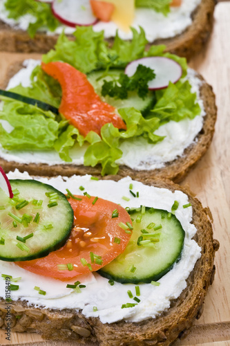 Whole grain bread, vegetables ,white cheese and salmon