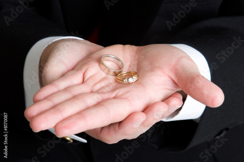 Man Holding Rings