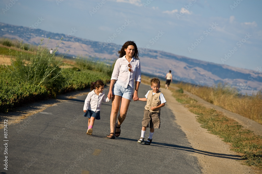 Happy family taking a walk Happy family taking a walk