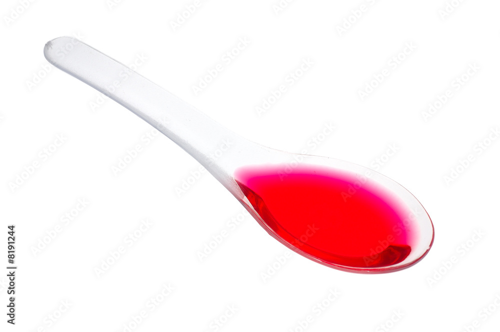 Pink medicine in spoon Pink medicine in spoon