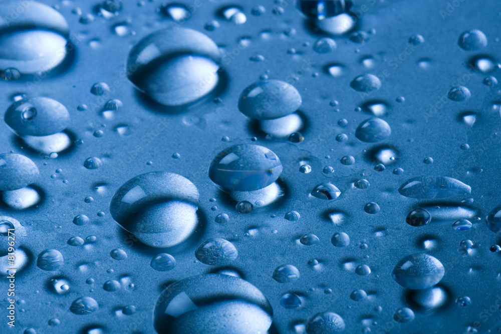 Water drops on a glass surface Water drops on a glass surface