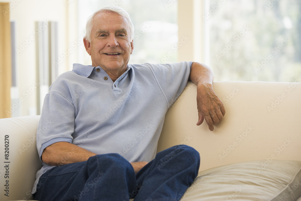 Man in living room smiling Man in living room smiling