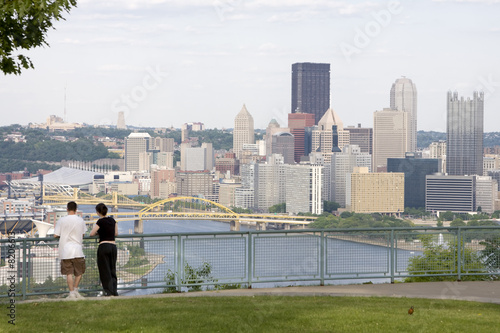 Young couple overlooking city