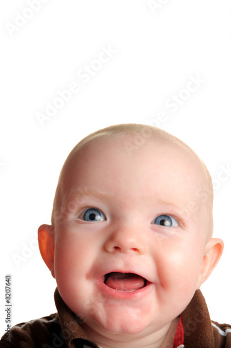 Cute happy baby looking up with room for text