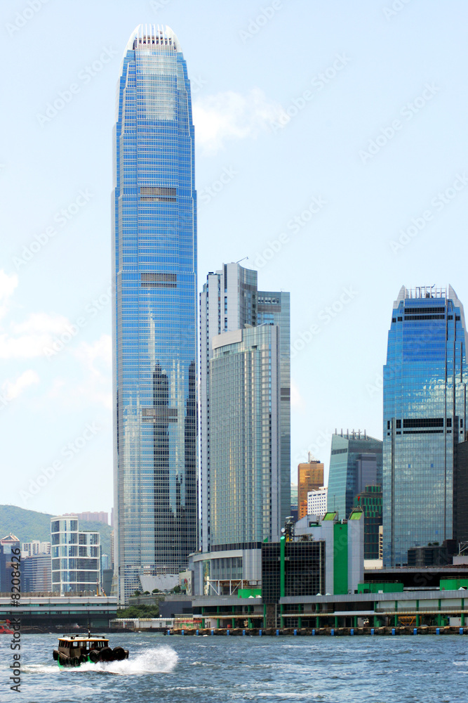 Fototapeta premium Boat in Victoria Harbor, Hong Kong