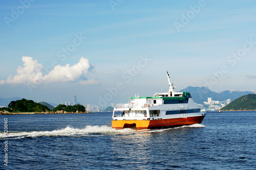 Canvas Print Ferry boat going to Hong Kong