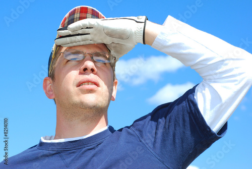 Golfer Looks to the Sky