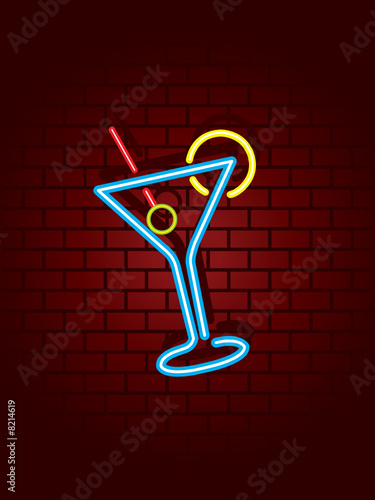 Neon cocktail sign against wall