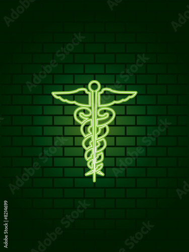 Neon medical sign against wall