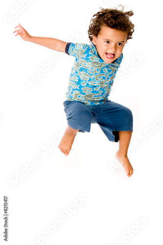 Fototapeta Naklejka Na Ścianę i Meble -  Young Boy Jumping