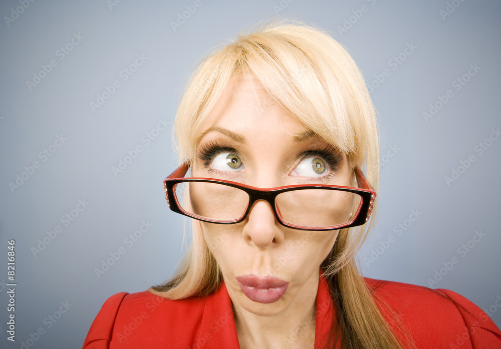 Woman in red making a funny face Woman in red making a funny face