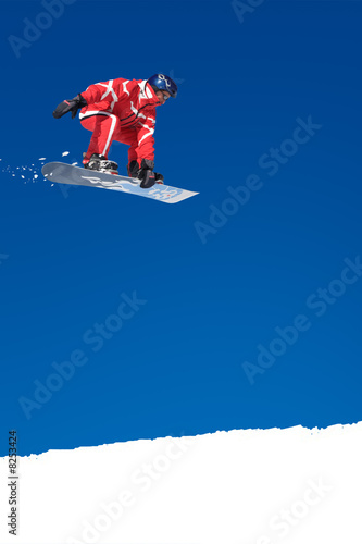 Snowboarder on jump Fototapet