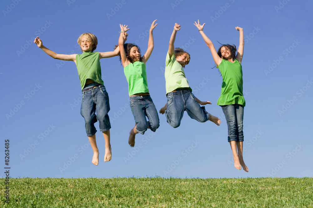 group of happy smiling summer children jumping group of happy smiling summer children jumping